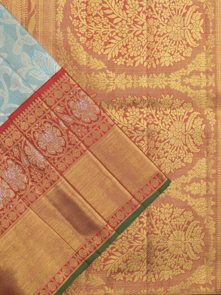 Traditional bridal kanchi tissue pattu saree in blue color with allover rich zari weaves