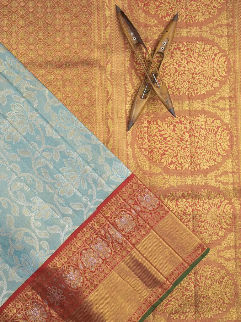 Traditional bridal kanchi tissue pattu saree in blue color with allover rich zari weaves