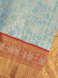 Traditional bridal kanchi tissue pattu saree in blue color with allover rich zari weaves