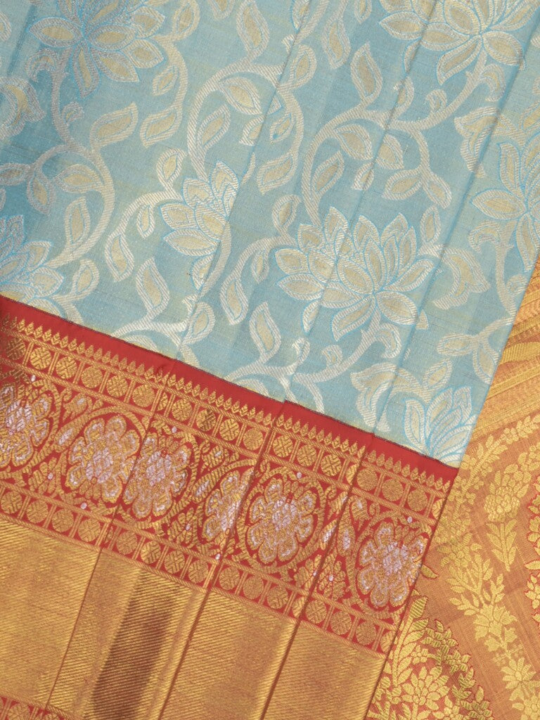 Traditional bridal kanchi tissue pattu saree in blue color with allover rich zari weaves