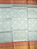 Traditional bridal kanchi tissue pattu saree in blue color with allover rich zari weaves