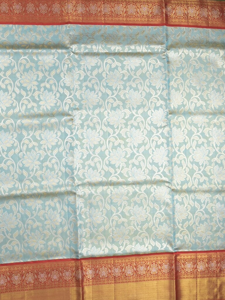 Traditional bridal kanchi tissue pattu saree in blue color with allover rich zari weaves