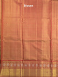 Traditional bridal kanchi tissue pattu saree in blue color with allover rich zari weaves
