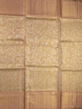 Traditional bridal kanchi tissue pattu saree in beige color with allover rich zari weaves