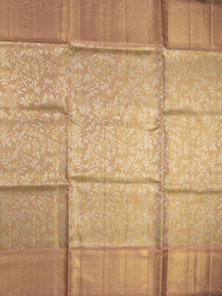Traditional bridal kanchi tissue pattu saree in beige color with allover rich zari weaves