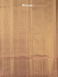 Traditional bridal kanchi tissue pattu saree in beige color with allover rich zari weaves
