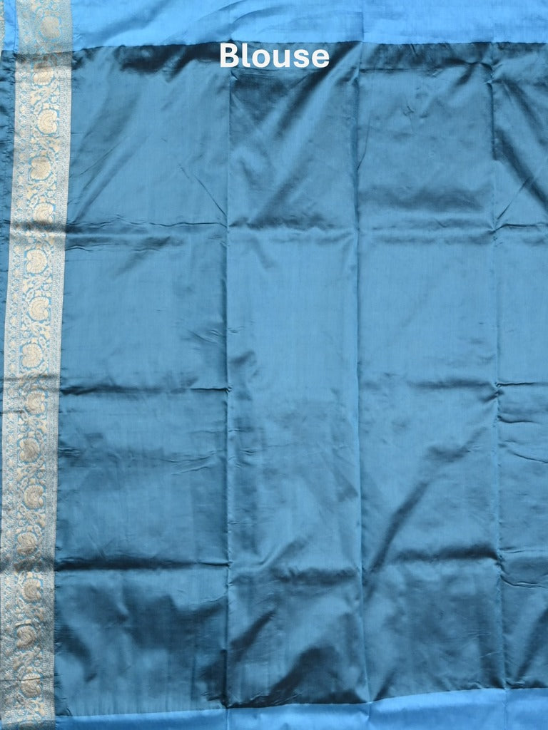 Dupion fancy saree peacock blue color allover zari motifs & zari border with rich pallu and plain blouse