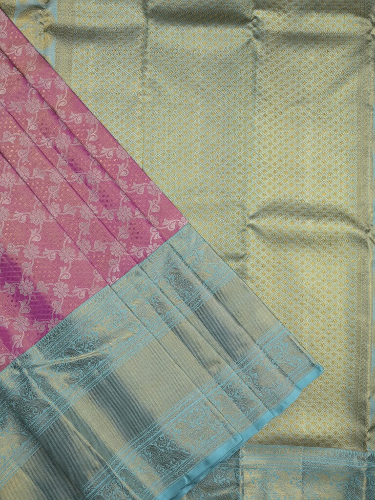 Traditional bridal kanchi tissue pattu saree in pink color with allover rich zari weaves