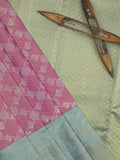 Traditional bridal kanchi tissue pattu saree in pink color with allover rich zari weaves