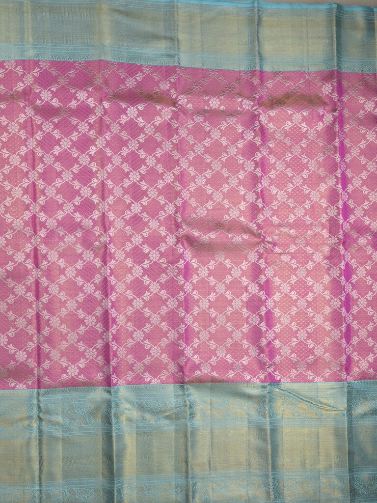 Traditional bridal kanchi tissue pattu saree in pink color with allover rich zari weaves