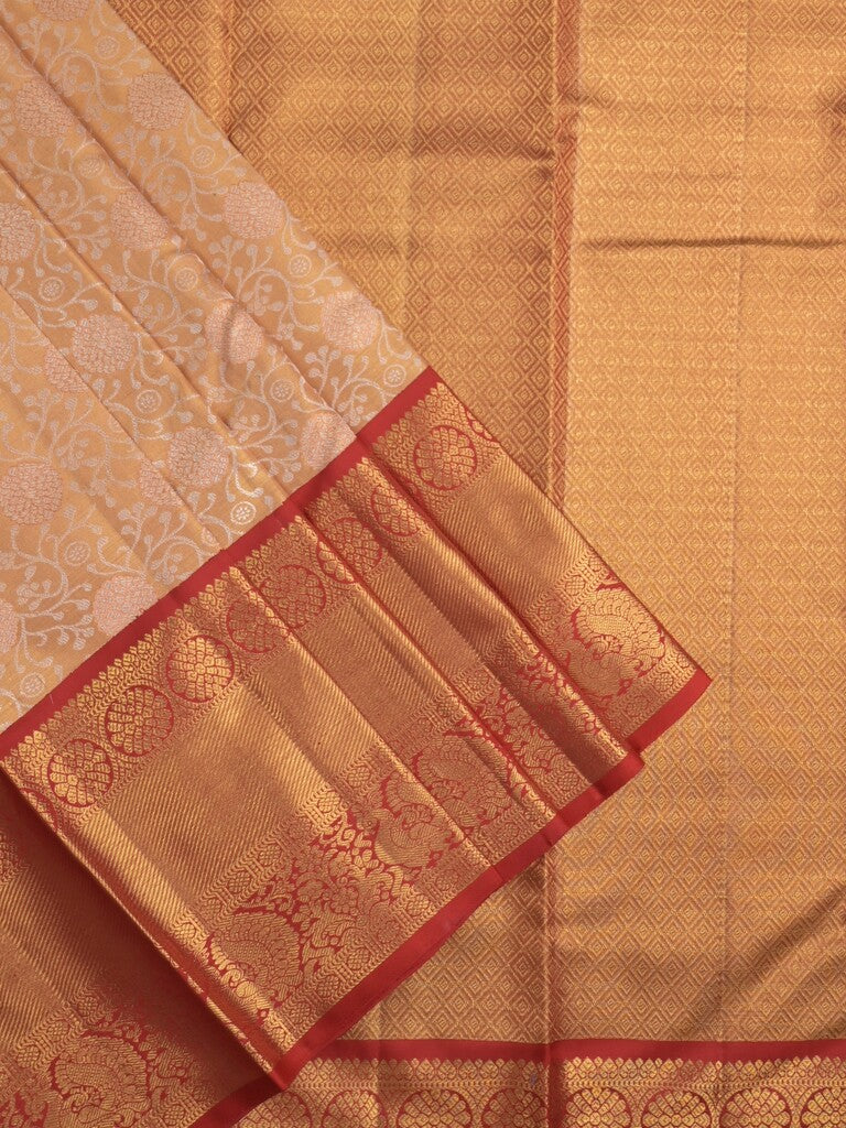 Traditional bridal kanchi tissue pattu saree in cream color with allover rich zari weaves