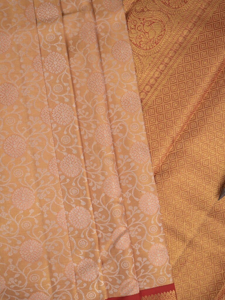 Traditional bridal kanchi tissue pattu saree in cream color with allover rich zari weaves