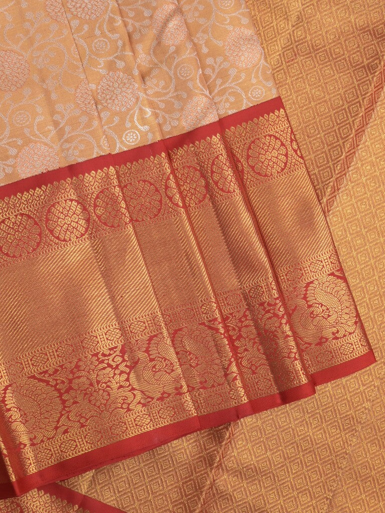 Traditional bridal kanchi tissue pattu saree in cream color with allover rich zari weaves