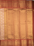 Traditional bridal kanchi tissue pattu saree in cream color with allover rich zari weaves