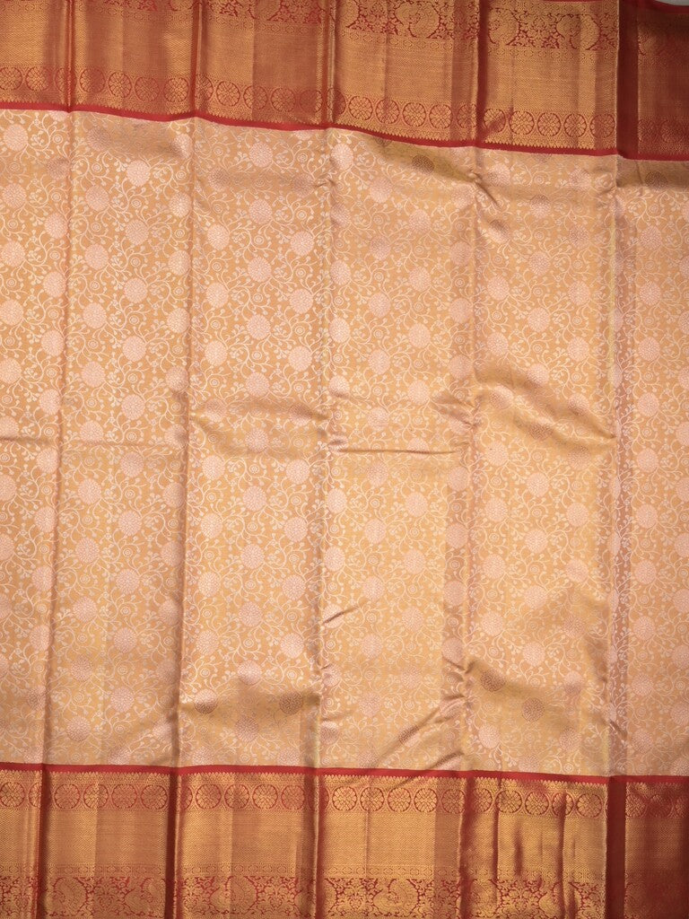 Traditional bridal kanchi tissue pattu saree in cream color with allover rich zari weaves