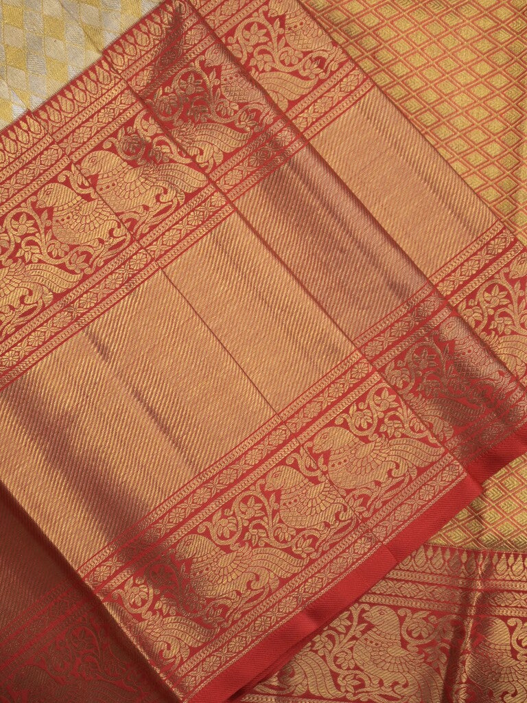 Traditional bridal kanchi tissue pattu saree in cream color with allover rich zari weaves
