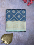 Raw mango pattu saree peacock blue color allover zari weaves & zari border with rich pallu and contrast plain blouse