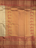 Traditional bridal kanchi tissue pattu saree in cream color with allover rich zari weaves