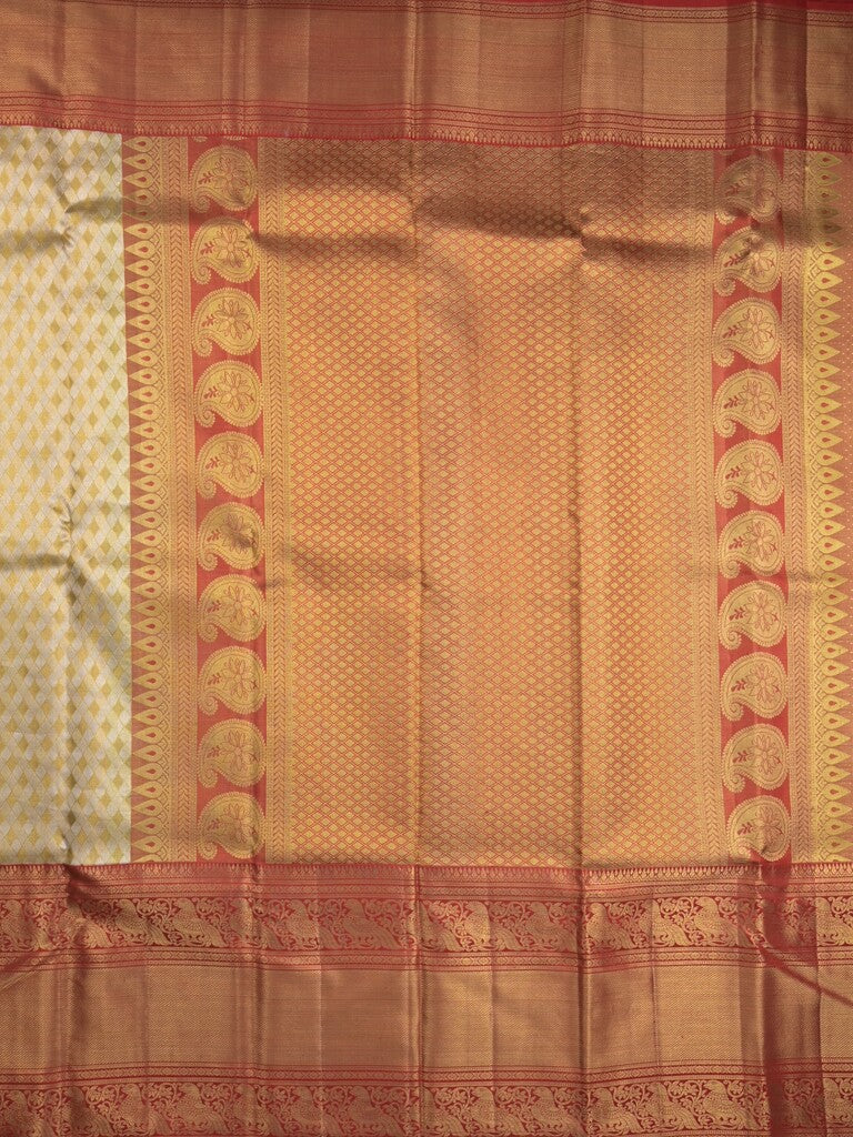 Traditional bridal kanchi tissue pattu saree in cream color with allover rich zari weaves