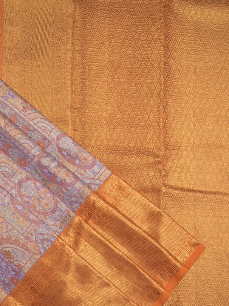 Traditional bridal kanchi tissue pattu saree in purple color with allover rich zari weaves