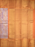 Traditional bridal kanchi tissue pattu saree in purple color with allover rich zari weaves
