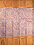 Traditional bridal kanchi tissue pattu saree in purple color with allover rich zari weaves