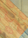 Traditional bridal kanchi tissue pattu saree in golden color with allover rich zari weaves