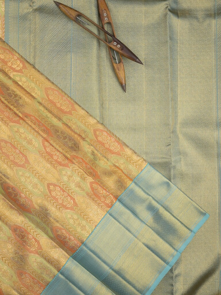 Traditional bridal kanchi tissue pattu saree in golden color with allover rich zari weaves