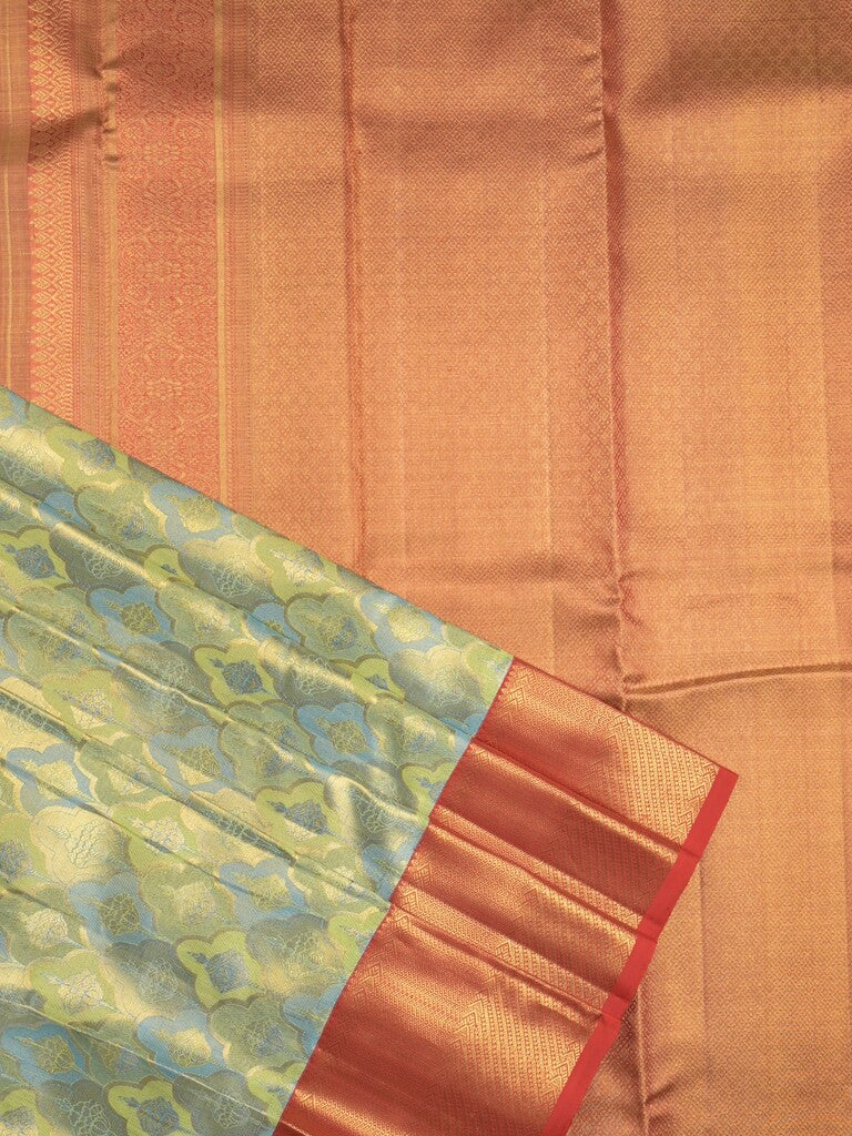 Traditional bridal kanchi tissue pattu saree in blue color with allover rich zari weaves