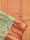 Traditional bridal kanchi tissue pattu saree in blue color with allover rich zari weaves