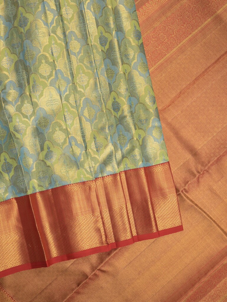 Traditional bridal kanchi tissue pattu saree in blue color with allover rich zari weaves