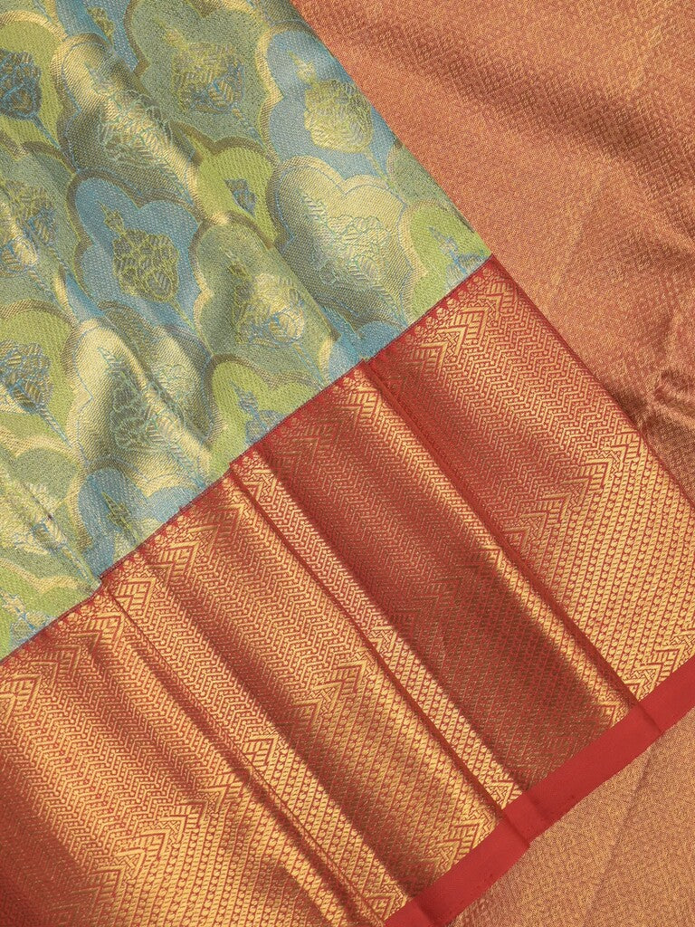 Traditional bridal kanchi tissue pattu saree in blue color with allover rich zari weaves