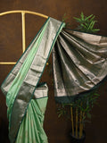 Kanchi pattu saree pista green color allover zari weaves & kanchi border with rich pallu and contrast plain blouse
