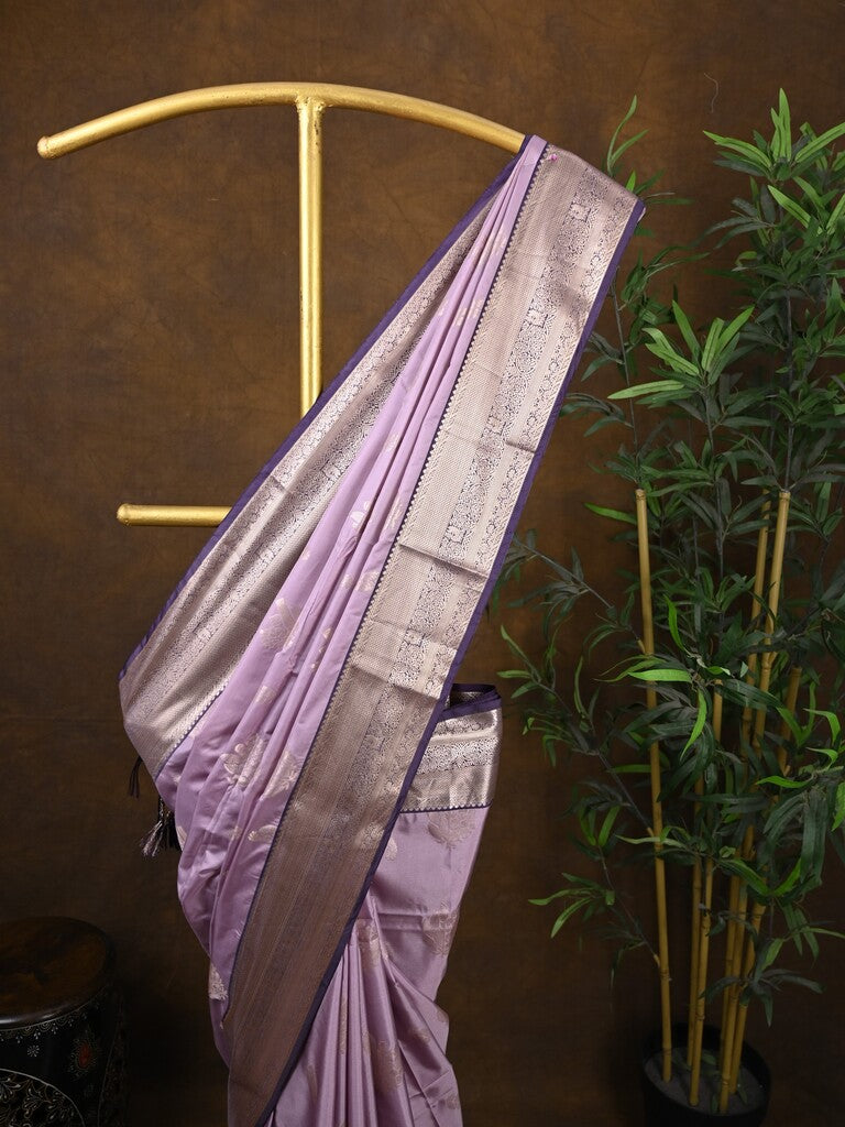 Kanchi pattu saree light lavender color allover zari weaves & kanchi border with rich pallu and contrast plain blouse