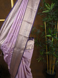 Kanchi pattu saree light lavender color allover zari weaves & kanchi border with rich pallu and contrast plain blouse