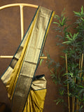 Kanchi pattu saree yellowish green color allover zari weaves & kanchi border with rich pallu and contrast plain blouse