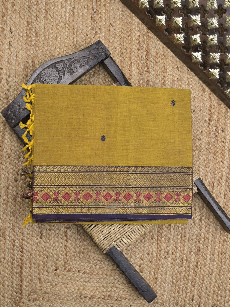 Kanchi cotton saree in mustard yellow color allover motifs with self pallu and matching blouse