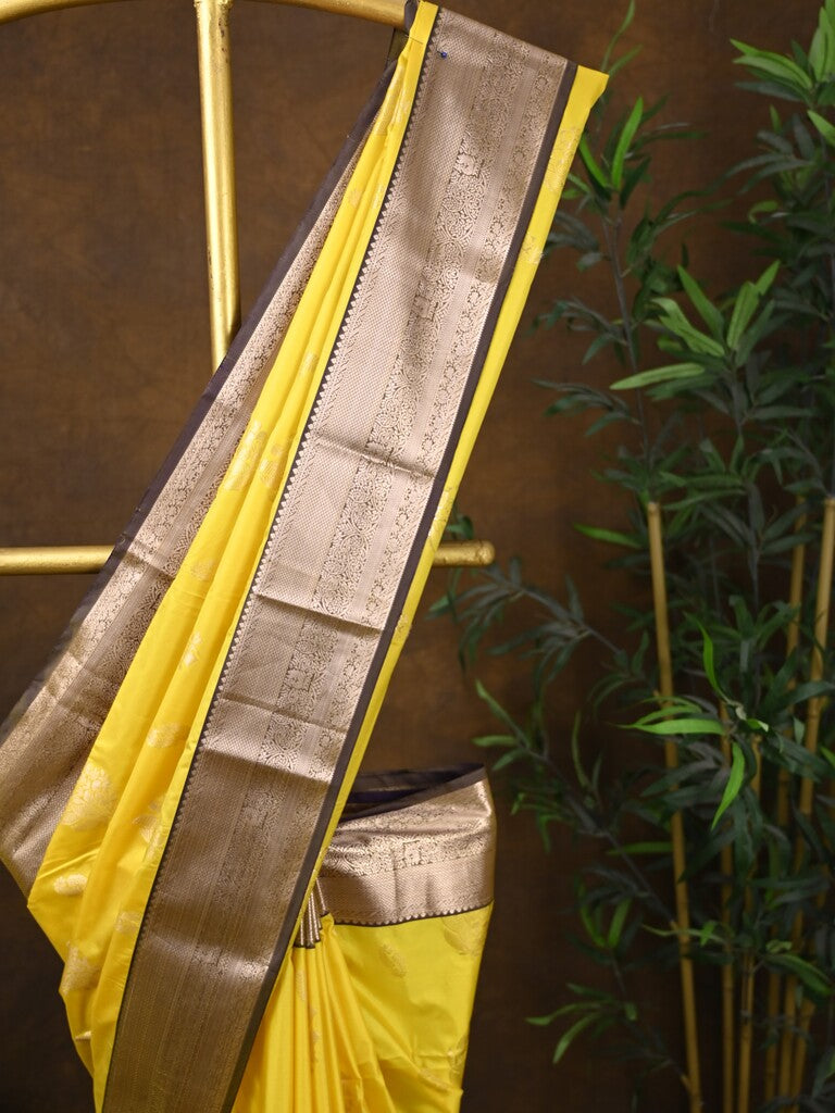 Kanchi pattu saree yellow color allover zari weaves & kanchi border with rich pallu and contrast plain blouse