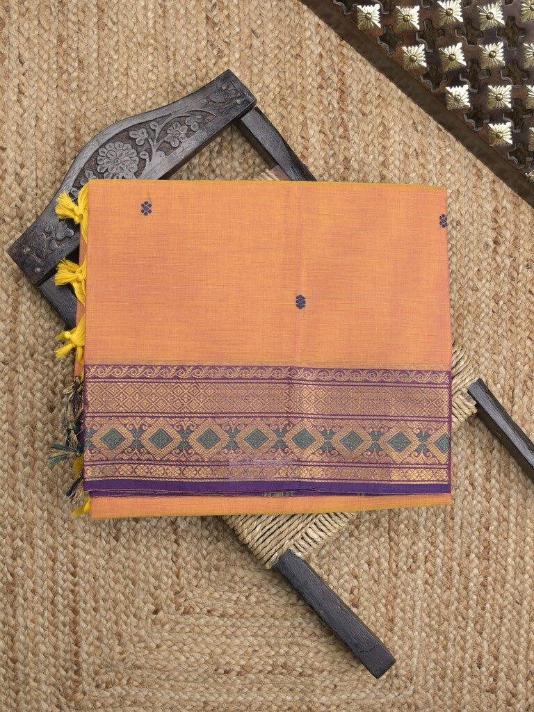 Kanchi cotton saree in orange color allover motifs with self pallu and matching blouse
