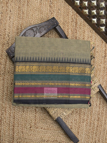 Kanchi cotton saree in grey color allover plain with self pallu and matching blouse