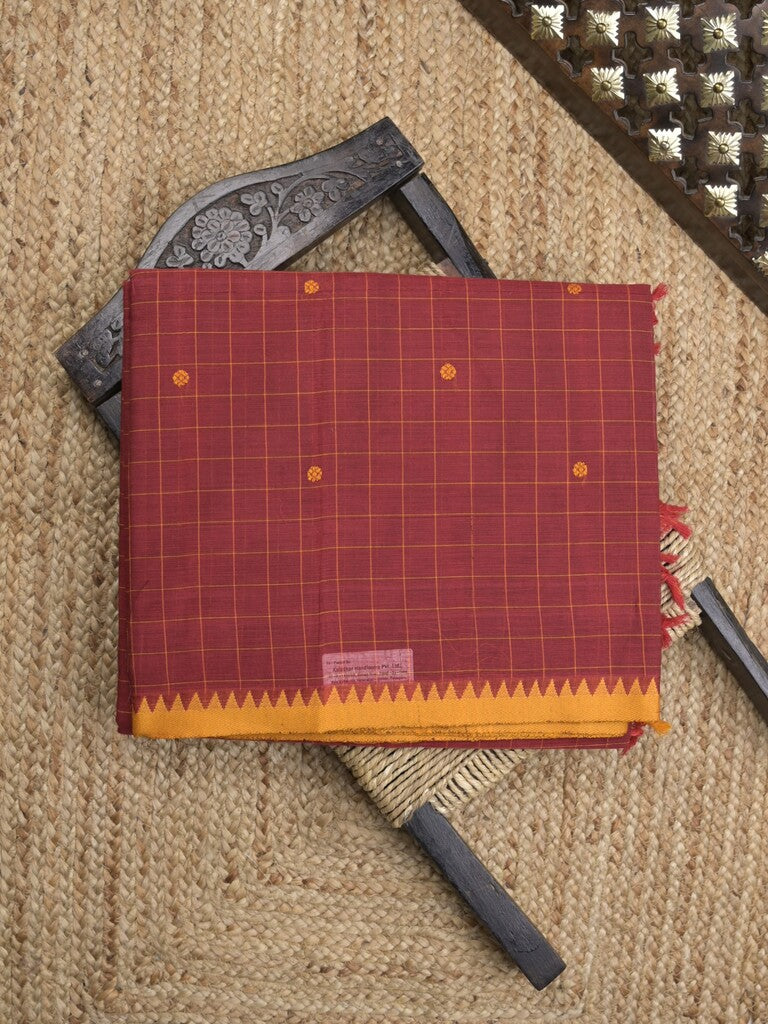Kanchi cotton saree in maroon color allover checks, motifs with self pallu and matching blouse