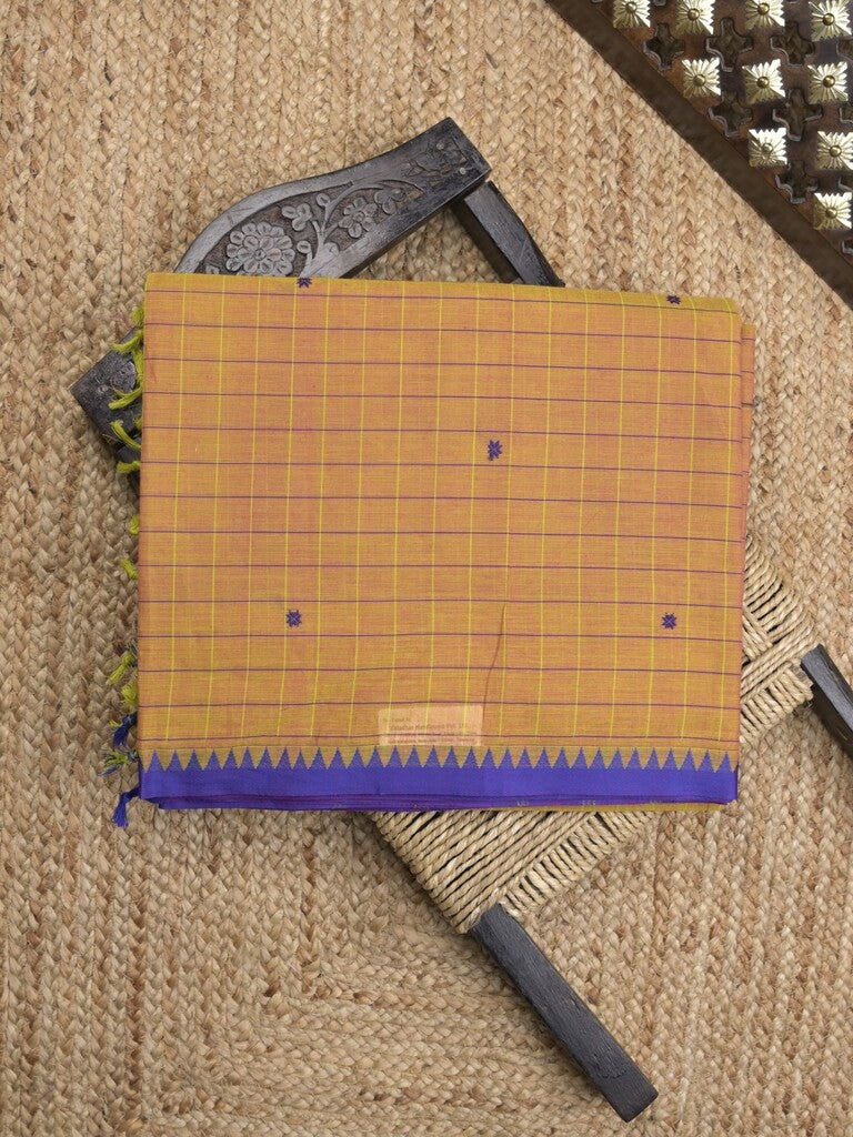 Kanchi cotton saree in beige color allover checks, motifs with self pallu and matching blouse