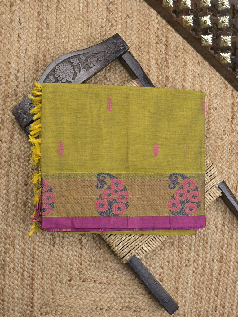 Kanchi cotton saree in olive green color allover motifs with self pallu and matching blouse