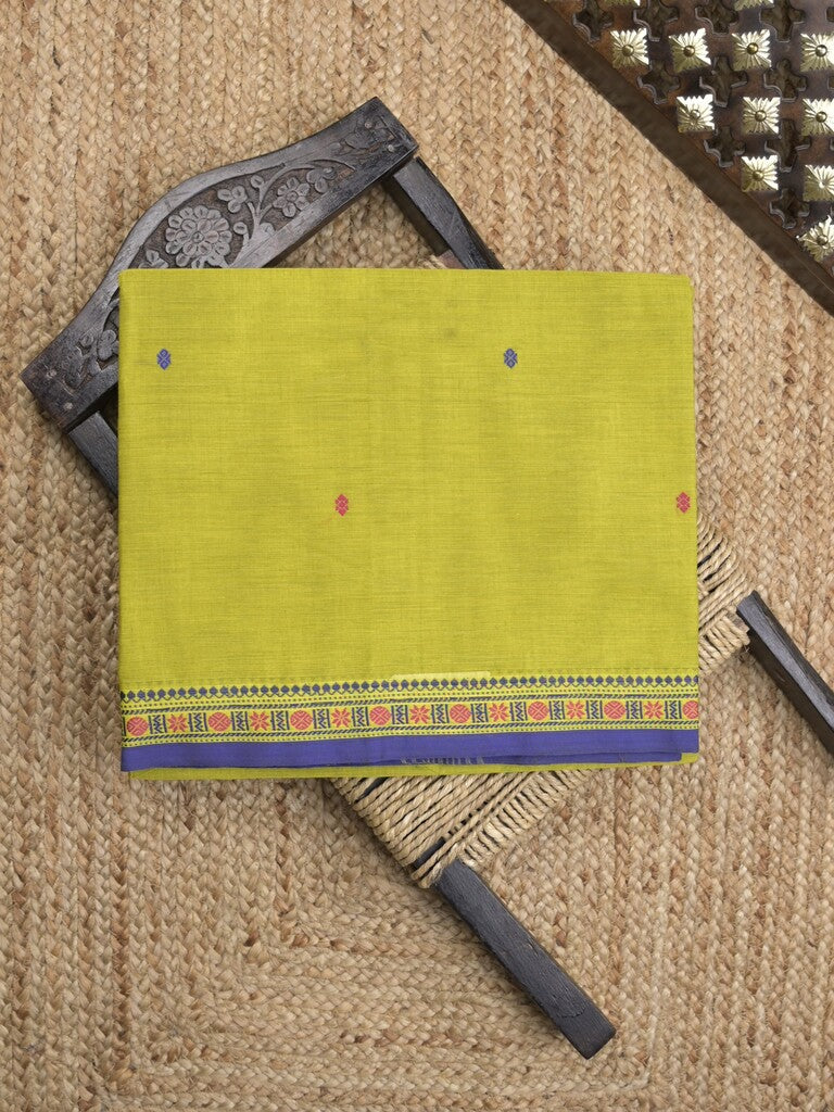 Kanchi cotton saree in parrot green color allover checks with self pallu and matching blouse