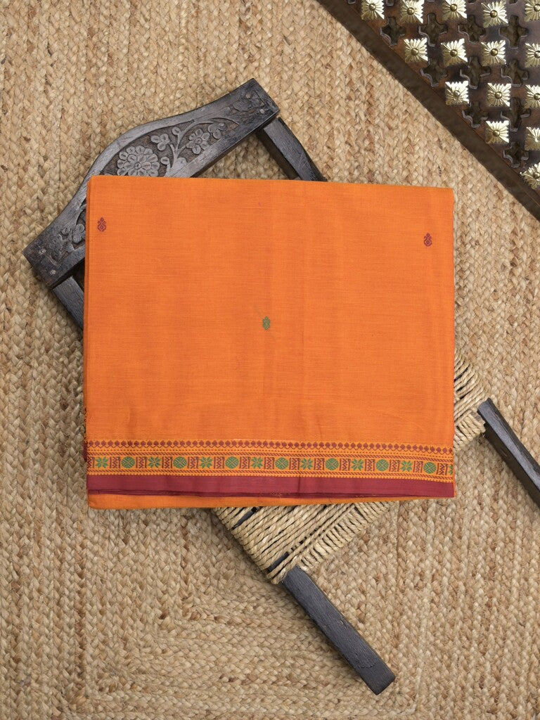 Kanchi cotton saree in orange color allover checks with self pallu and matching blouse