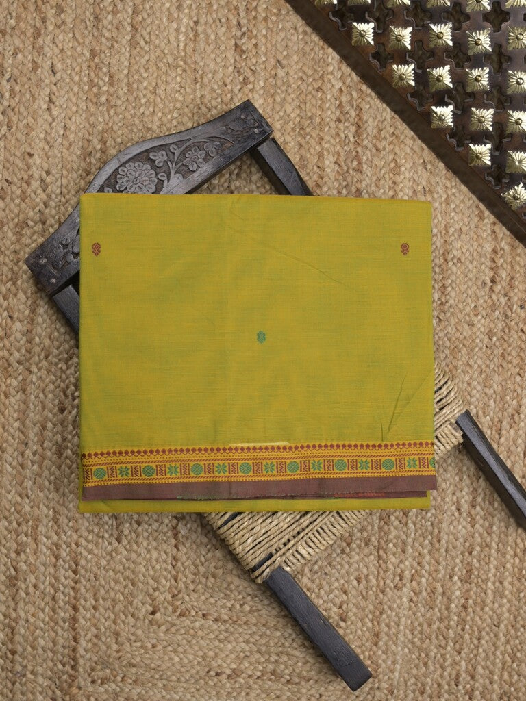 Kanchi cotton saree in olive green color allover checks with self pallu and matching blouse