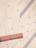 Kanchi cotton saree in cream color allover checks with self pallu and matching blouse