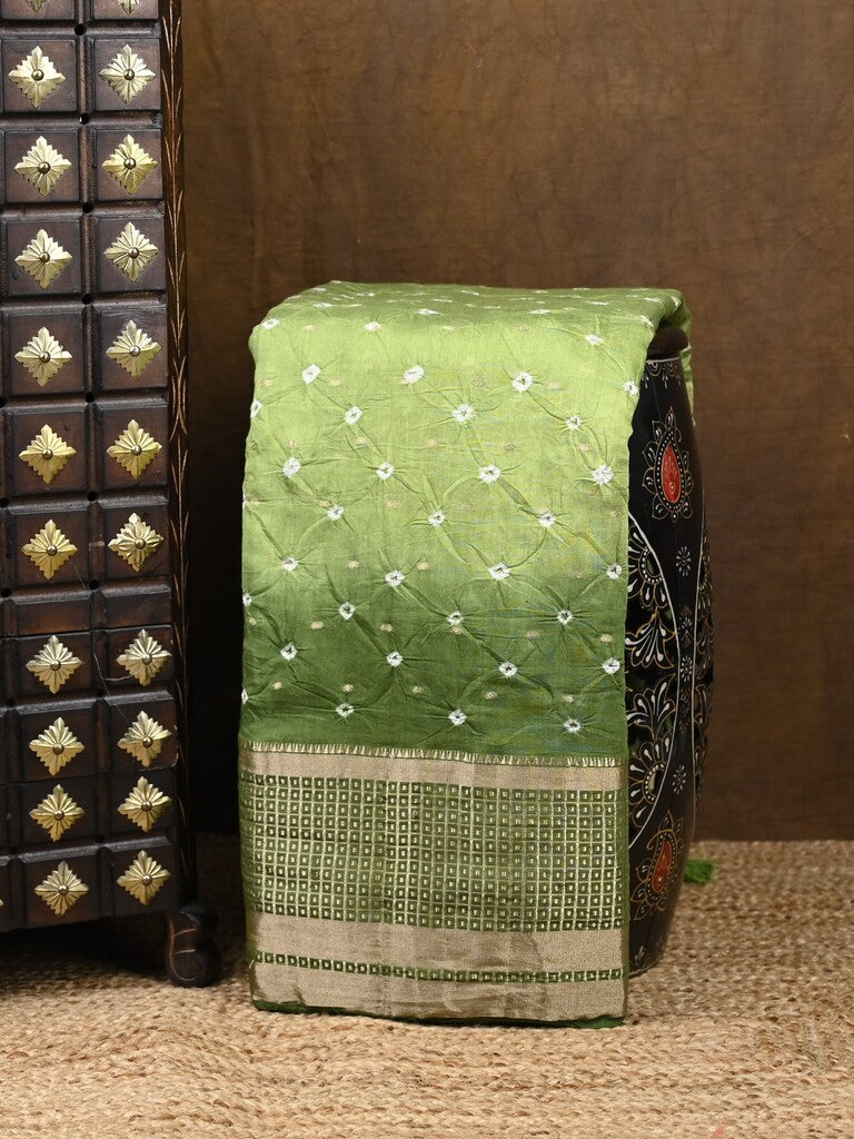 Munga bandhani fancy saree light green color allover work & zari border with contrast pallu and blouse