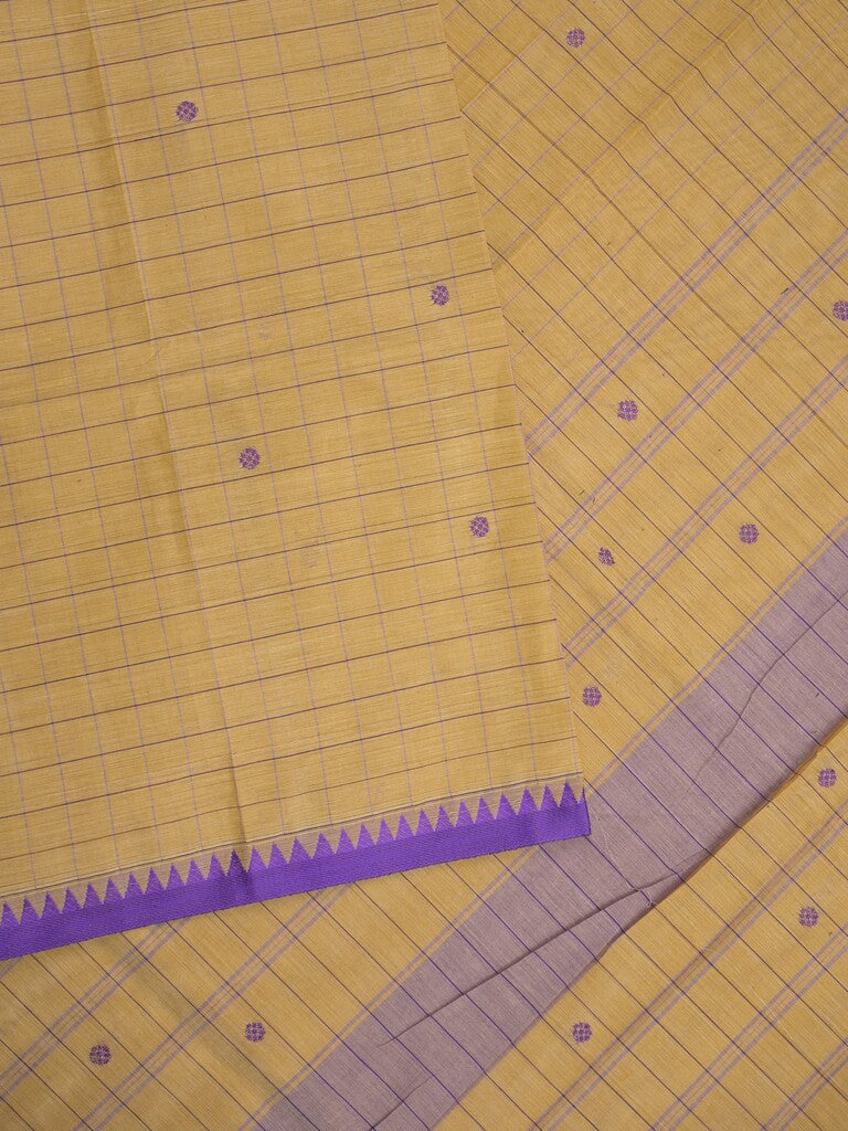 Kanchi cotton saree in cream color allover checks, motifs with self pallu and matching blouse