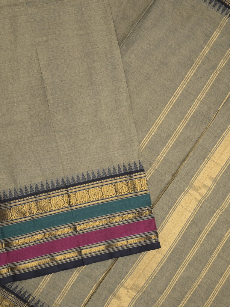 Kanchi cotton saree in grey color allover plain with self pallu and matching blouse
